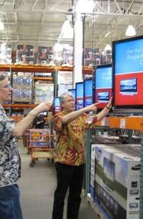 The boys picking out the wide-screen TVs they felt certain Costco would give them for such an excellent signing